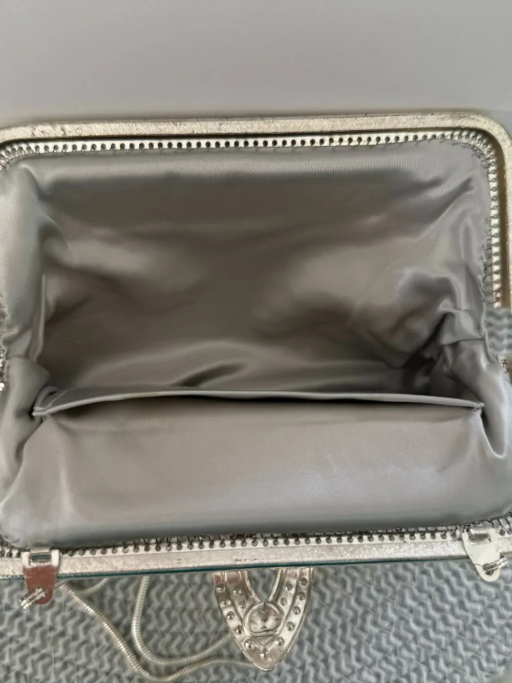 Silver colored mesh pattern purse/clutch
